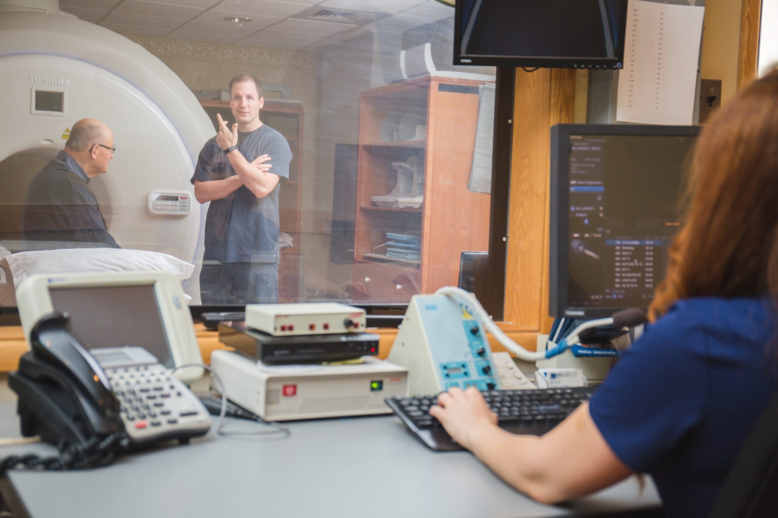 patient with doctor mri machine